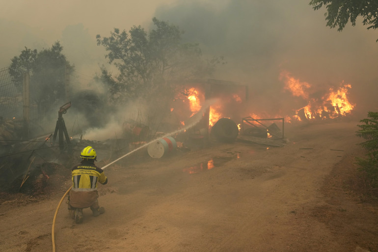 More than 200,000 people flee or lock down as wildfires sweep France and Spain More than 200,000 people flee or lock down as wildfires sweep France and Spain