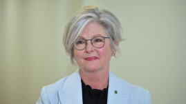 Australian MP loses both legs after alleged car attack, husband says