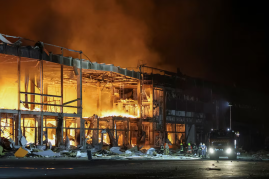 At least 37 killed after Russian strike sparks major fire and explosions at a warehouse in Bucha