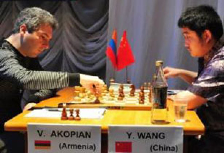Hakobyan Fails in Grand-Prix with Armenian Flag Turned Upside Down 