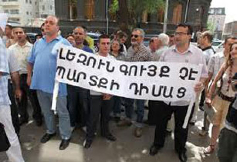 Protesters oppose re-opening of foreign-language schools