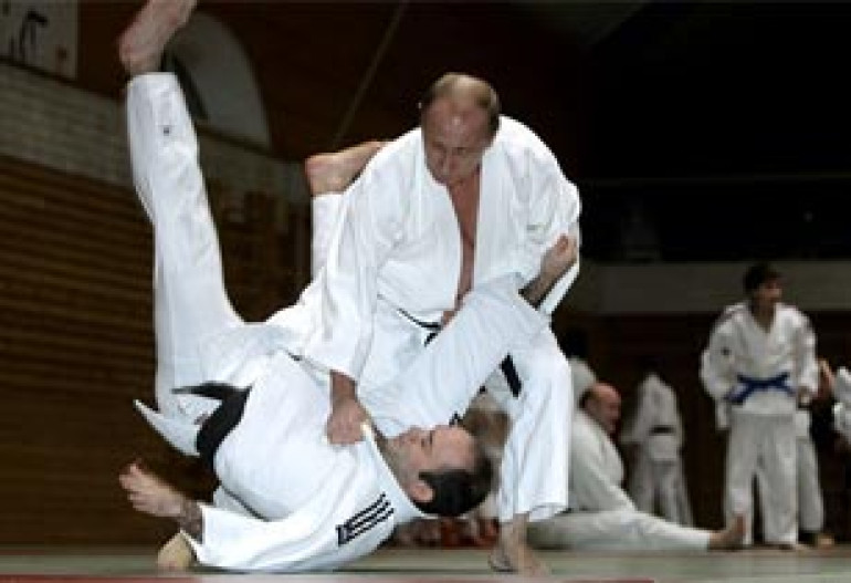 Russia's Putin trains with Armenian, Georgian and Russian athletes in Petersburg