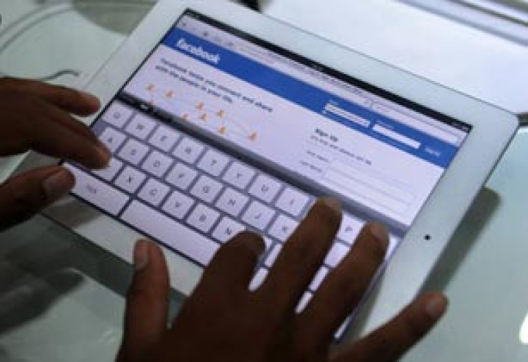 Facebook adding ads to its Ticker 