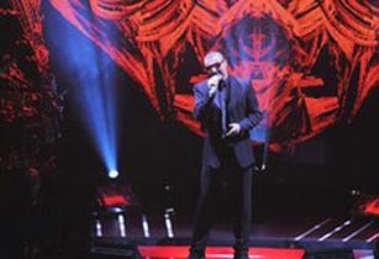 George Michael postpones shows because of pneumonia
