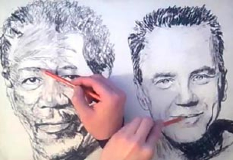 Amazing artist draws with both hands simultaneously (video)