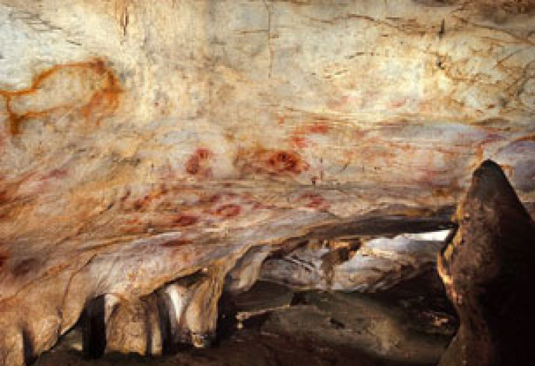 Red dots become oldest cave art