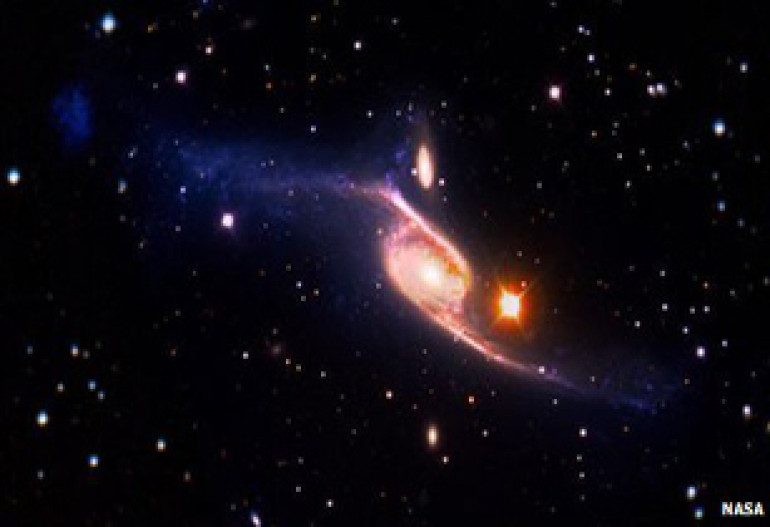 Galaxy crash sparks large spiral