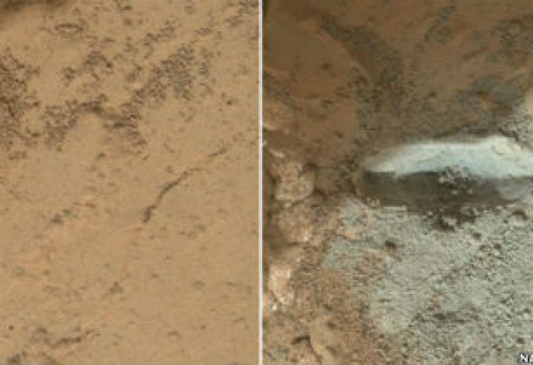 Curiosity Mars rover hammers into rock