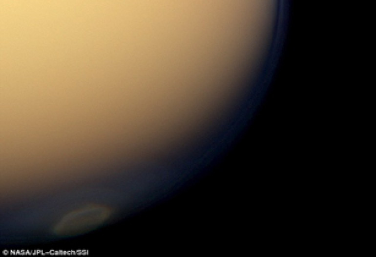 Ice clouds on Titan signal start of seven year autumn on south pole of Saturn's largest moon