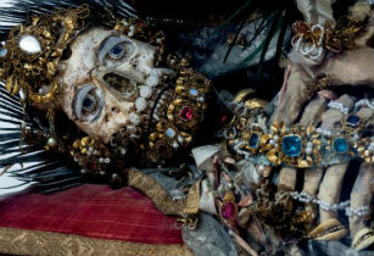 Incredible skeletal remains of Catholic saints still dripping in gems and jewellery discovered