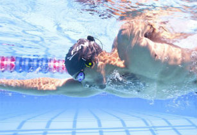 Incredible underwater headphones transmit music to swimmers' ears by vibrating sound through cheekbones
