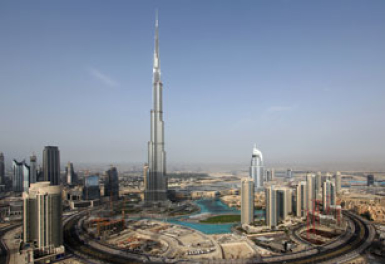 Designers launch bizarre bid to wrap world's tallest building in a cling film-style fabric... just for art