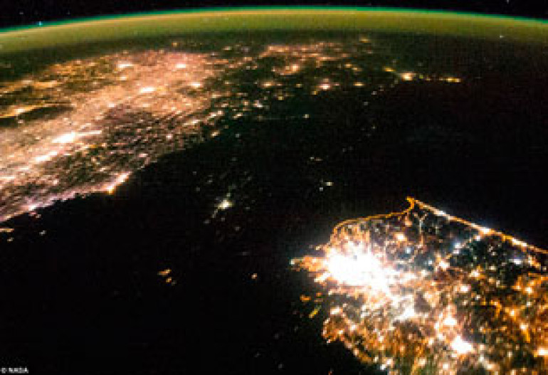 North Koreans really in the dark: Astonishing NASA picture shows backward communist state as a black patch on the planet