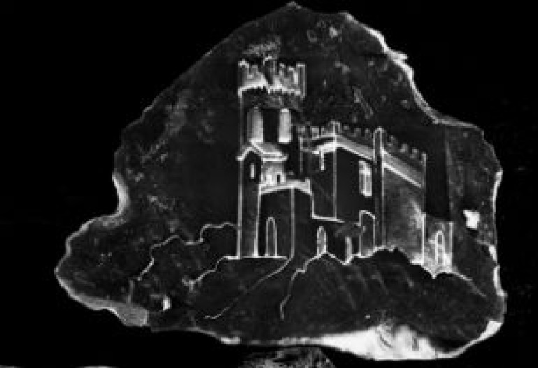Smallest sandcastle: Incredible images show castle etched onto a GRAIN of sand