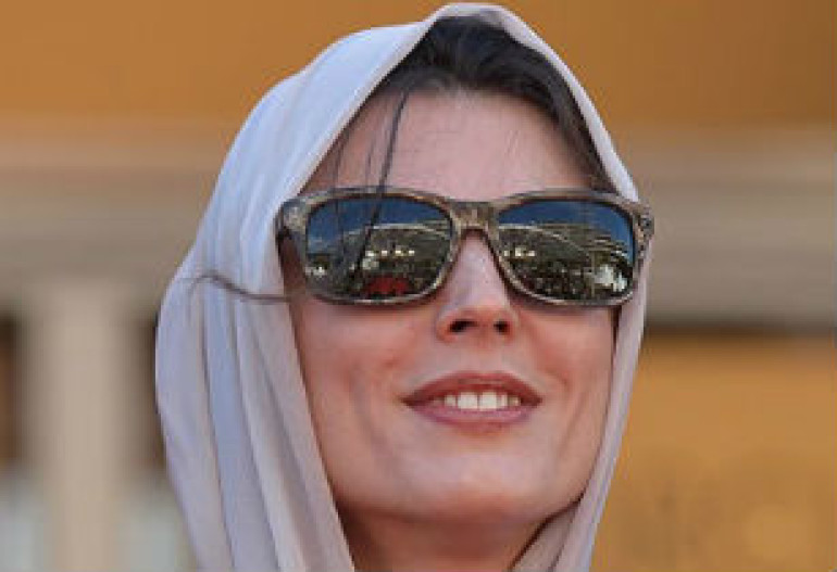 Iranian actress apologizes for kissing Cannes Film Festival director