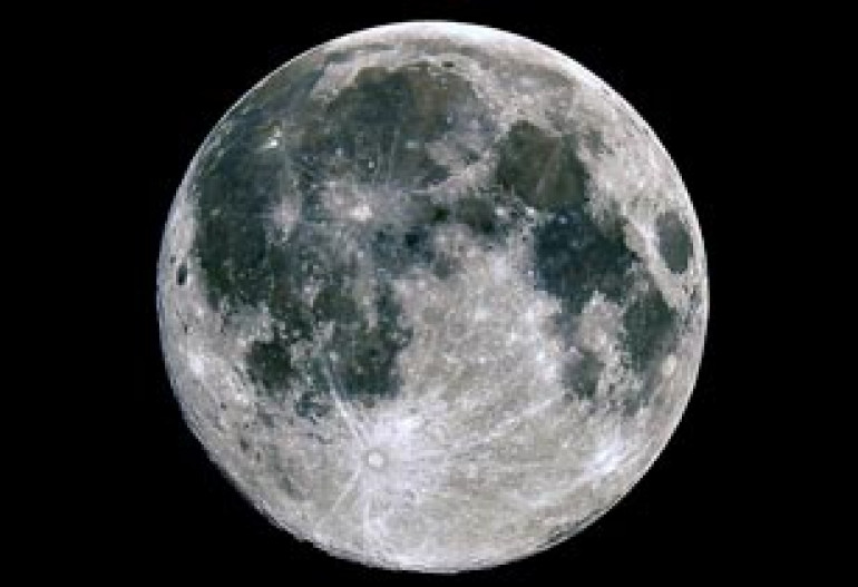 Satellite and supermoon: Stunning images reveal tiny spacecraft engulfed by spectacularly lit lunar surface