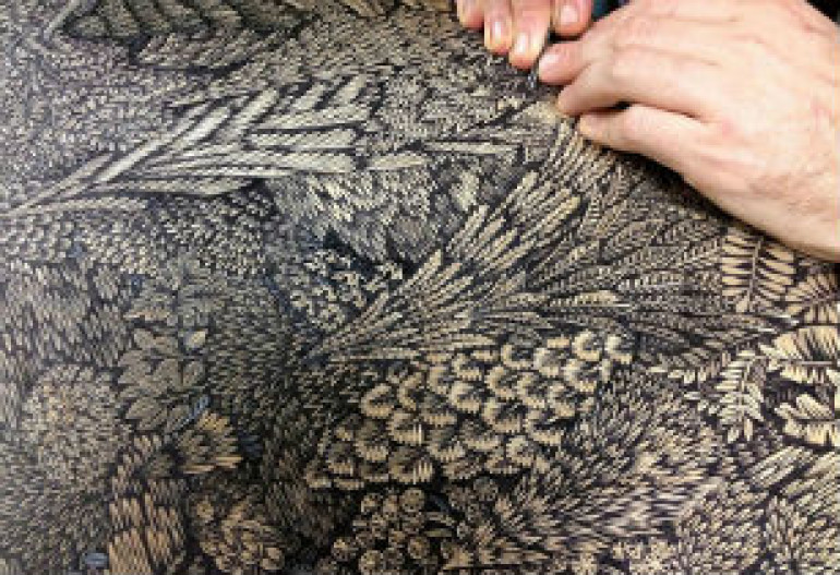 Artists spend almost 2 years carving epic forest landscape out of wood