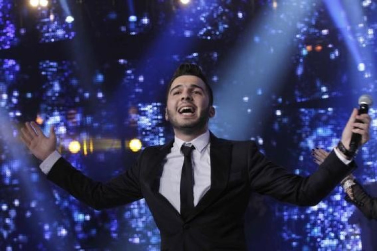 Syrian wins Arab Idol contest, steers clear of politics
