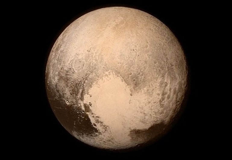 New Horizons: Nasa spacecraft speeds past Pluto