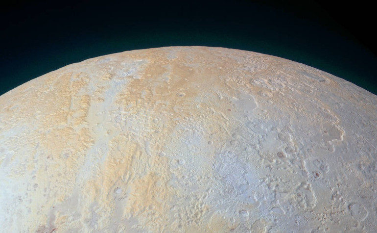 NASA unveils frozen canyons of Pluto’s north pole