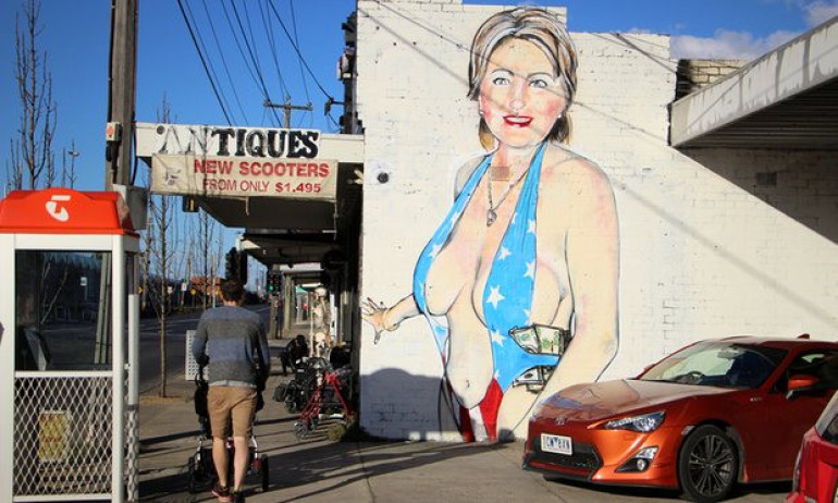 Melbourne artist threatened with fine for Clinton bikini mural