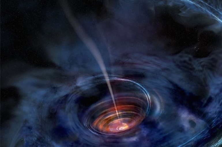 Black holes could be "back doors" to other parts of universe, scientists claim