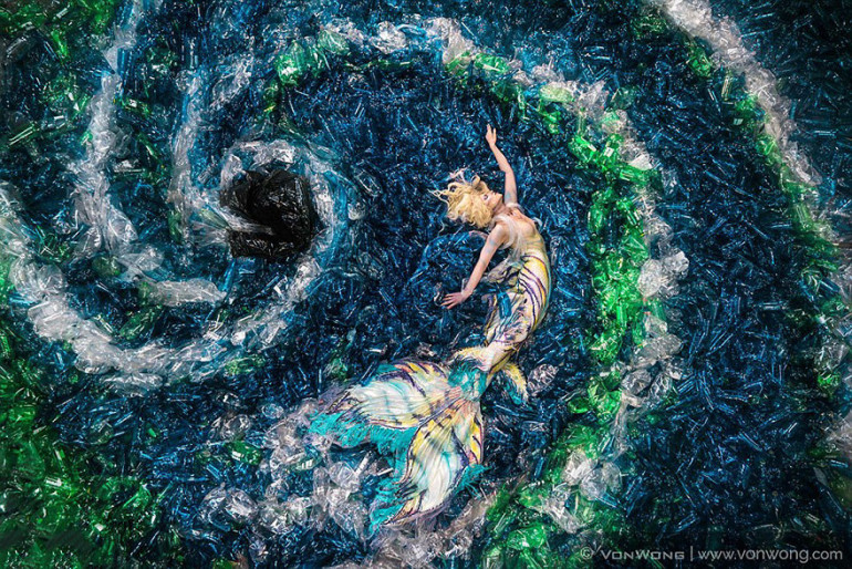 Mermaids swim in 10,000 plastic bottle ocean to show how much average person pollutes earth