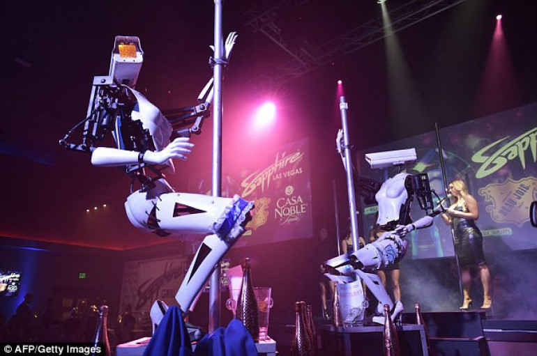 Pole-dancing robot stripper made from scrap take to the stage at a Las Vegas CES show