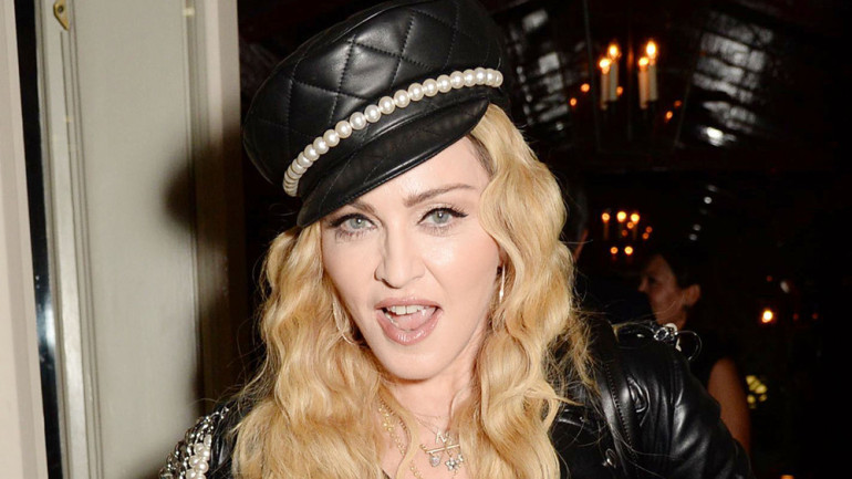 'I'm going to breathe in the Covid-19 air':  Madonna says she has tested positive for antibodies