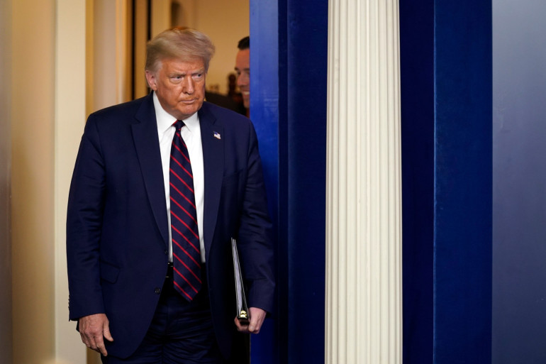 Trump permanently banned from Twitter over risk he could incite violence