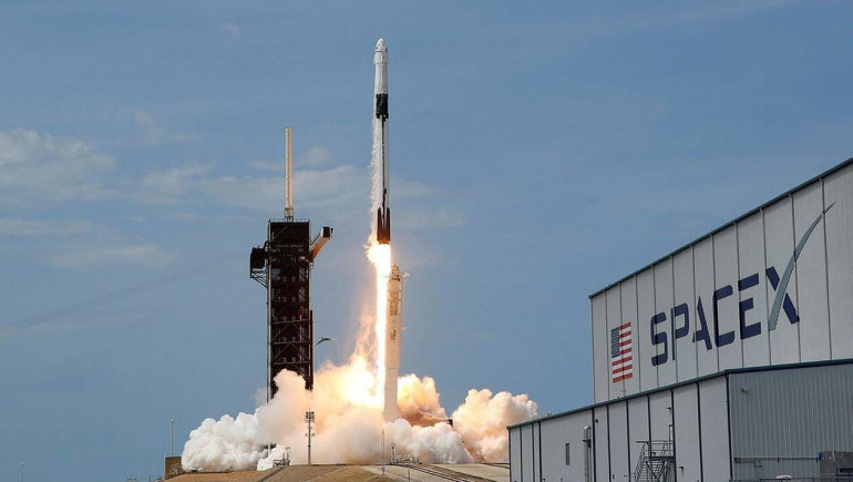 SpaceX launches a record 143 satellites on one rocket, aces landing