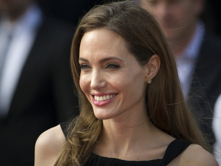 Angelina Jolie details her personal strife while plugging her new movie