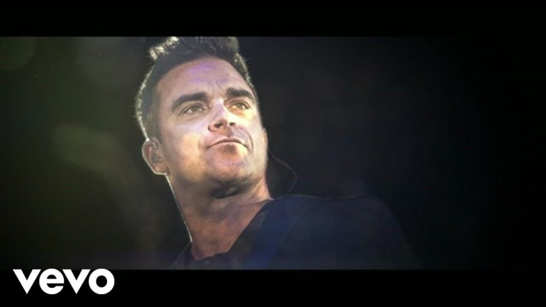 Robbie Williams in New Music Video, 'Be A Boy'