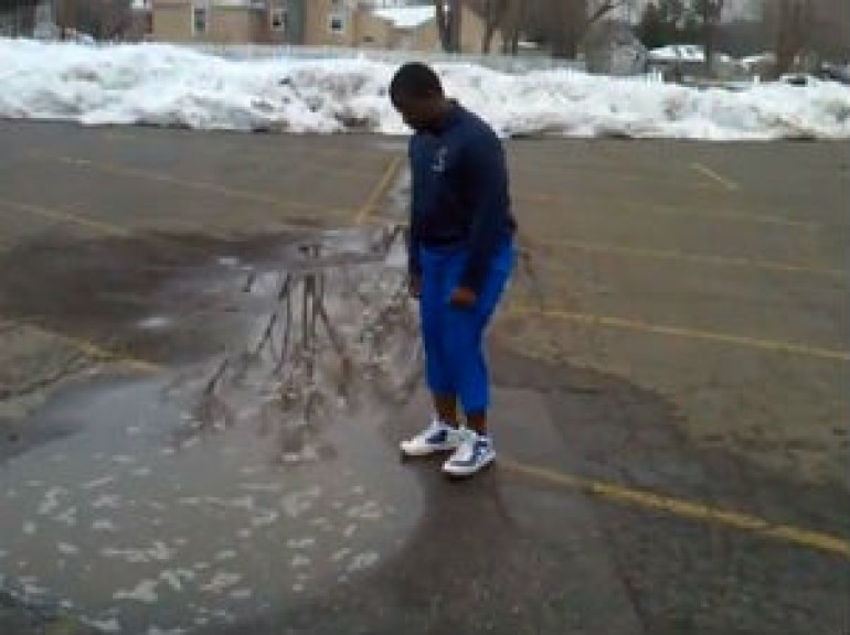 Man Dives into Water for $1