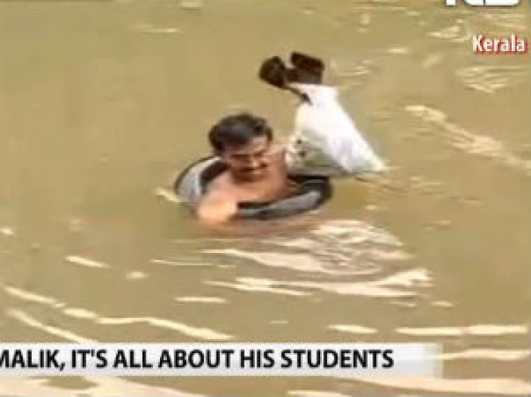 Teacher who Swims through River Everyday to Get to Students