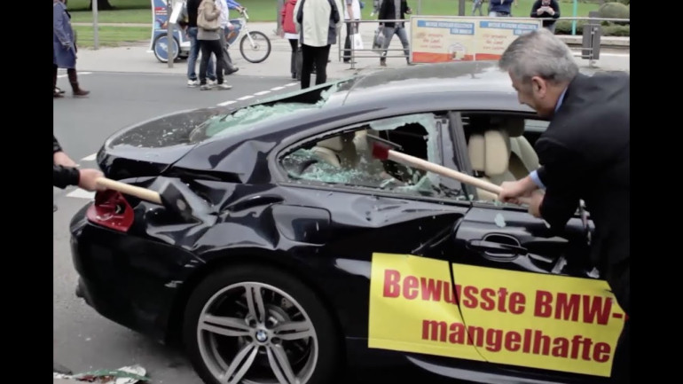 Businessman Smashes $150,000 Worth Car as Sign of Protest